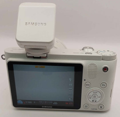 Samsung NX1000 20-50mm + 16mm wide with extra lenses and flash with charger Boxed white