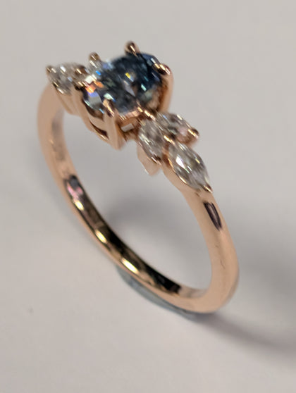 9ct rose gold ring with sea blue stone
