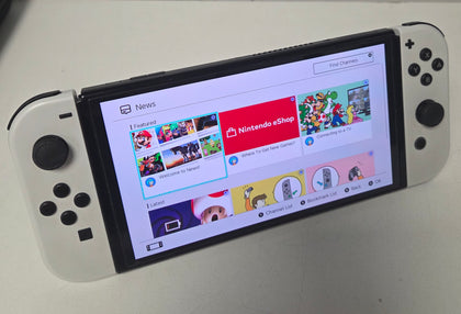 Nintendo Switch OLED 32GB - White with 2 unboxed games & 16gb Memory card ( No Tv Cradle )