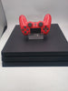 Sony PlayStation 4 Pro 1TB Console with red controller