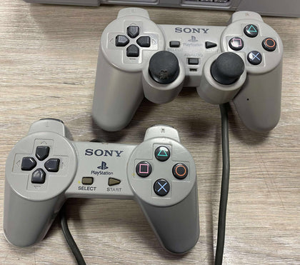 PlayStation 1 with 2 controllers