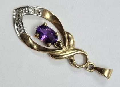 9ct Gold Pendant with Purple Stone