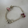 Pandora Bracelet with 3 Charms, Hallmarked 925 ALE, 27.22G (8" Length)