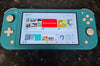 Nintendo Switch Lite turquoise & Crash Bandicoot Game