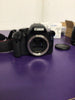 Canon EOS 550D SLR Digital Camera with 18-55mm lens, 2 batteries and a charger.