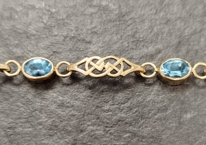 9ct Yellow Gold Celtic Bracelet with 5 Bezel Set Blue Stones - 7