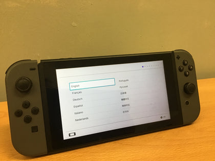 Nintendo Switch with Grey Joy-Cons Dock and Minecraft.