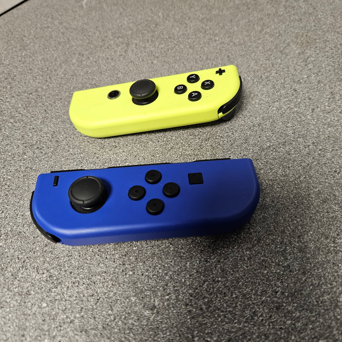 Nintendo Switch Joycons Blue (left) & Neon Yellow (Right) | Cash