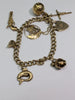 9CT GOLD CHARM BRACELET
