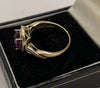 9CT gold ring with purple stone (N)