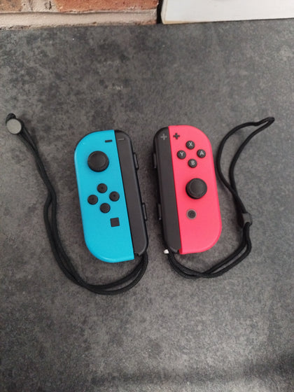 Nintendo Switch Joy-Con Controller Pair (Neon Red/Neon Blue) with wrist straps