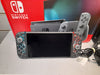NINTENDO SWITCH CONSOLE NEON RED AND BLUE With Batman Case + Accessories
