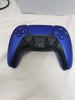 Playstation 5 Console Slim Console with Blue Dual Sense Controller sticker marks on side plates and orange stain on side