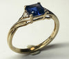 9CT GOLD RING WITH BLUE STONE SIZE L1/2