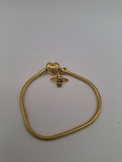 Pandora Base Metal Gold PLated bracelet With bee charm IN ITS ORIGINAL BOX 7INCHES  LENGHT.