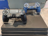 Playstation 4 Pro Console 1TB Black + 2 controllers