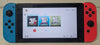 Nintendo Switch Neon Red/Blue & 1 Unboxed Game