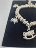 ***SALE*** Silver 925 105.2G CHARM BRACELET WITH 7 CHARMS