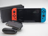 Nintendo Switch Neon Red/Neon Blue with two games