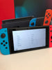 Nintendo Switch with Neon Blue / Neon Red Joy-Con Controllers
