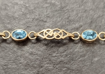 9ct Yellow Gold Celtic Bracelet with 5 Bezel Set Blue Stones - 7