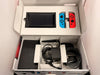 nintendo switch red and blue joycons boxed