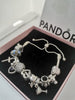 Pandora Bracelet with 11 Charms, 36.87Grams, Hallmarked 925 ALE, Adjustable Strap APPROX 12"