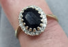 9ct ring black/clear stones - Size M.5