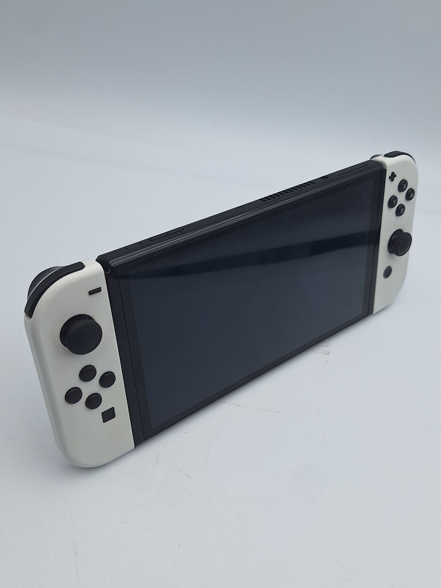 Nintendo Switch OLED 64GB black/white gaming console with dock
