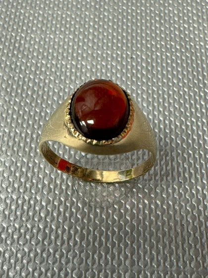 9ct Gold Ring set with Red Stone.