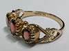 9CT GOLD RING WITH RED STONES SIZE O 1/2