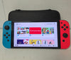 Nintendo Switch OLED Neon Red/Blue & 1 Game