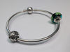 PANDORA SILVER BANGLE WITH CHARMS PRESTON STORE