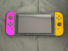 switch console purple and orange joycon