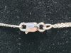 18CT - White gold Cross With Double Chain 9-18" - 10.56g - With Clear Stones