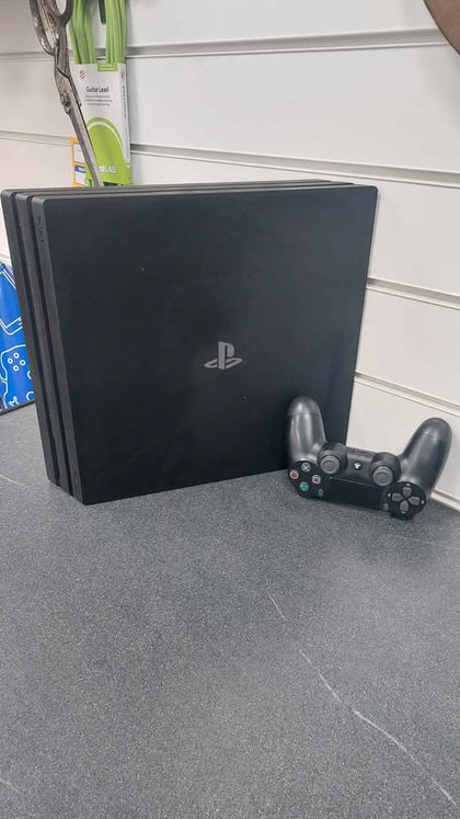 PlayStation 4 pro console black 1TB unboxed with 1-pad and cables in good condition