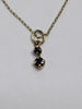 9CT GOLD 18" CHAIN WITH PENDANT/BLACK STONES PRESTON STORE