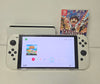 Nintendo Switch OLED - White & 2 Games (1 Unboxed)