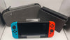 Nintendo Switch Console 32GB with neon red/blue joy-con unboxed