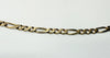 9ct gold figaro chain 21.5"