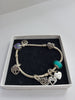 Pandora Bracelet 7 Charms ALL HALLMARKED , 28,64g, Size: Length Approx. 7.5"