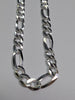 Brand new silver Figaro chain