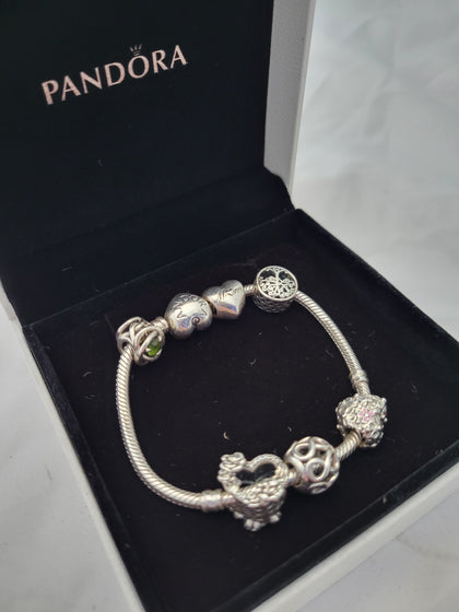 Pandora Bracelet with 6 Pandora Charms, Hallmarked 925 ALE, 29.35Grams, Approx. 7