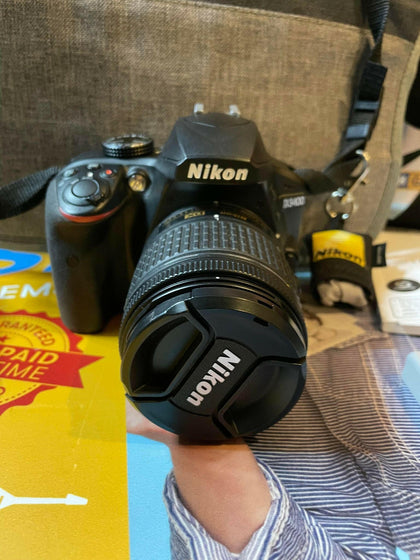 Nikon D3400 Digital Camera with lens.