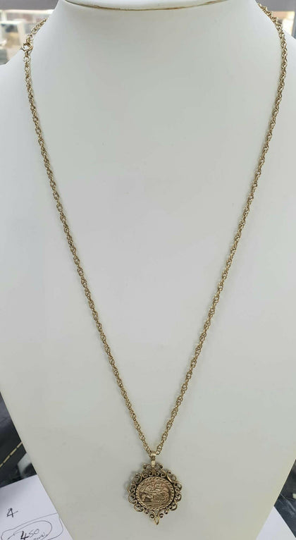 9ct gold 25” chain with St Christopher pendant.