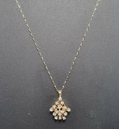 9ct Necklace With Beautiful Burst Style Pendant.