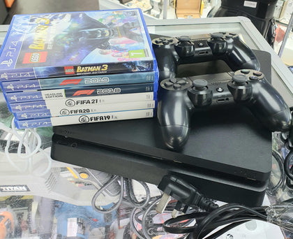 Sony PS4 Slim 500gb with 2 Controllers + 6 games.