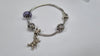 Silver Bracelet with 4 charms 17.5cm LEYLAND