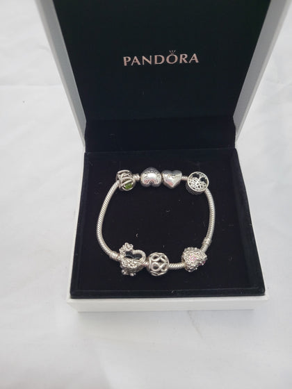 Pandora Bracelet with 6 Pandora Charms, Hallmarked 925 ALE, 29.35Grams, Approx. 7