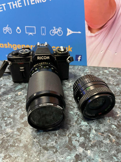RICOH  CAMERA WITH 2 LENSES.